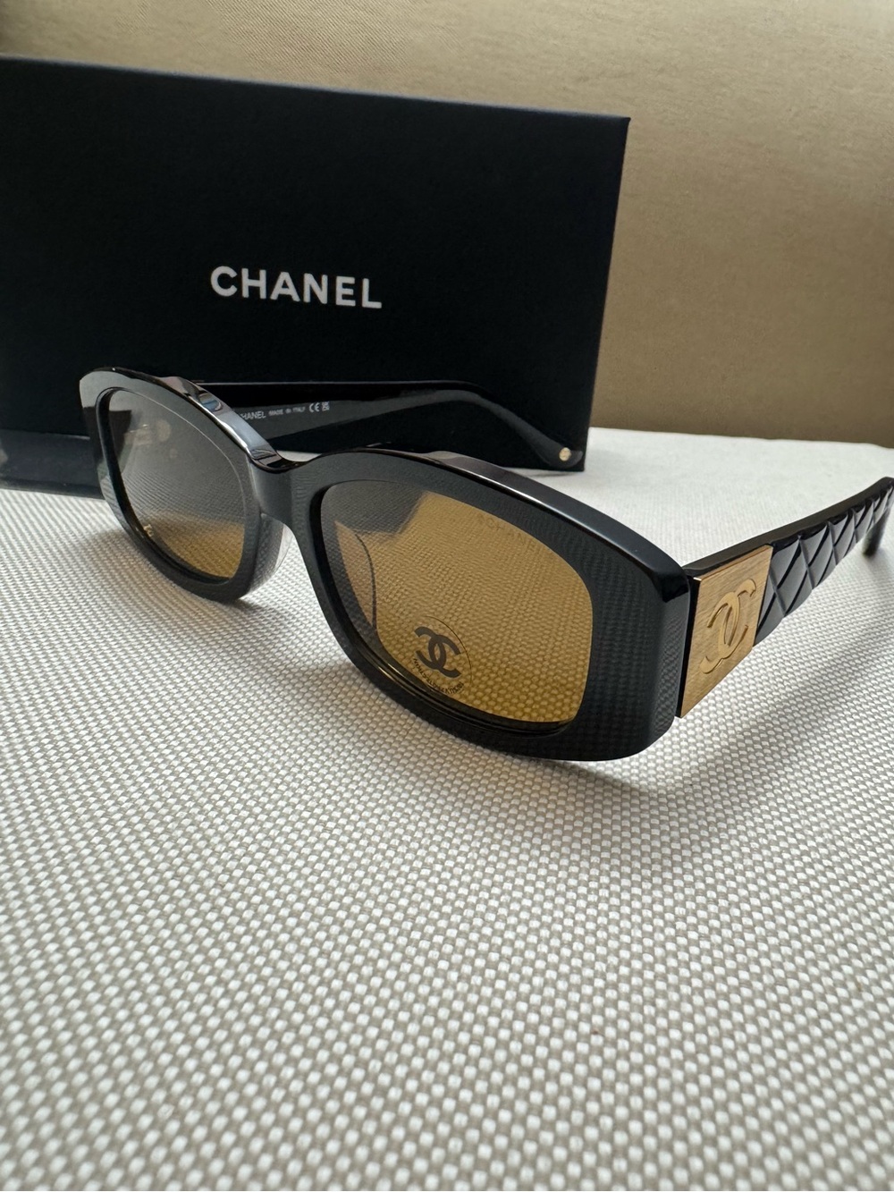 CHANEL Black Frame Sunglasses with Amber Lenses
